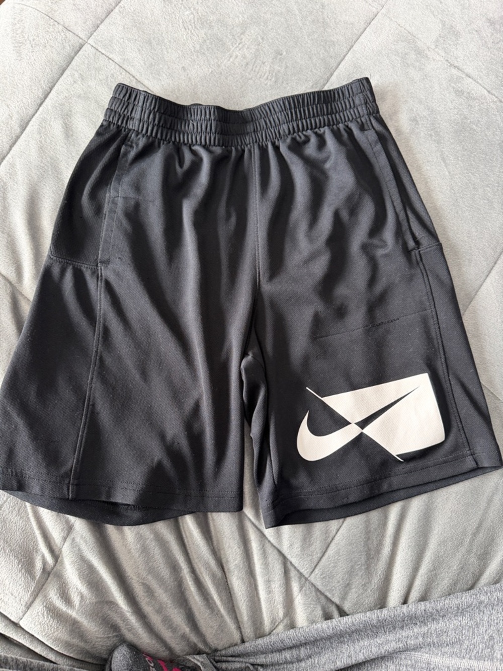 Nike Black Shorts with White Swoosh Patch